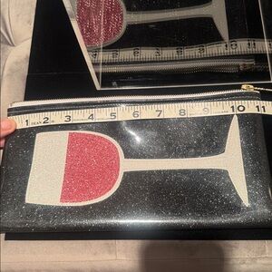 Julie Mollo, NYC, black/pink wine Clutch. PVC/rubber material as gold listed.